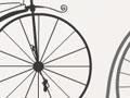 Front wheel of velocipede showing the pedals