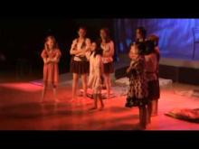 Students perform on stage