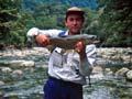 Angler and brown trout