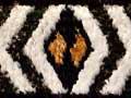 A kahu huruhuru (feather cloak), made from feathers of kererū and kākā