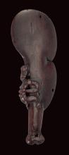 Decoratively carved wooden club