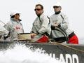 Russell Coutts at helm of yacht