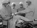 Trainee vets at the operating table