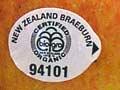 Organic apple with sticker