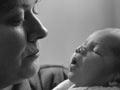 Midwife and baby, 1990