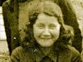 Girl's head cropped from group photograph