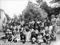 Class photograph on lawn in front of school