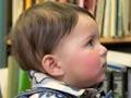 General practitioner with baby