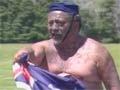 Tame Iti shooting a flag, 2005 