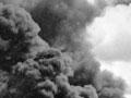 Oil tanks burning in Darwin, February 1942