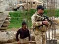 New Zealand soldiers in Afghanistan: inspecting an NZAID project