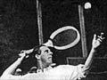 Anthony Wilding mid-serve, 1914
