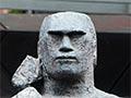 'To a Maori figure cast in bronze outside the chief post office, Auckland'