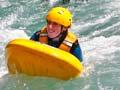 River surfers