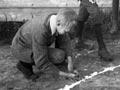 Boys playing marbles, around 1900