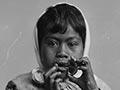 Māori girl playing a Jew's harp, early 1900s