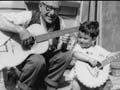 Making music, Tasman Street, Wellington, 1964 