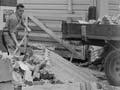 The collapsed masonry facade of a Martinborough shop litters the pavement