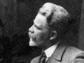  George Edmund Butler alongside one of his paintings