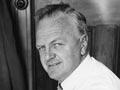 Nevile Lodge at a drawing table, 1959