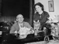 Paul Schramm and Diny Schramm with their cats