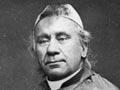 Philippe Viard in a clerical robe and hat