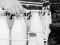 Putting the milk bottles out