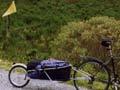 Mountain bike tourist with trailer