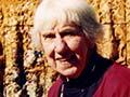 Doreen Blumhardt with Christian Science church wall