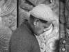 Master wood carver Pineāmine Taiapa with examples of traditional carving