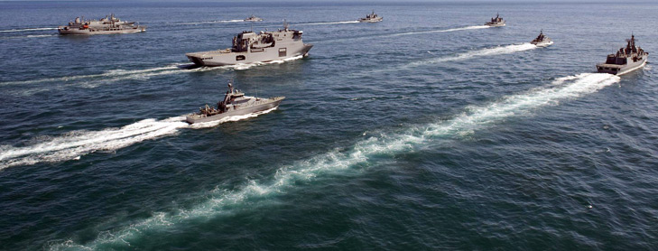 Convoy of navy vessels on the ocean